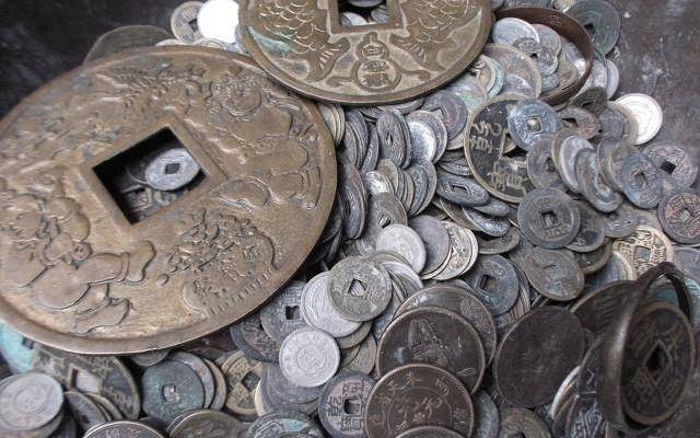 在网络上拍卖成交的铜钱和银币价值上百万,这是骗局还是真的?